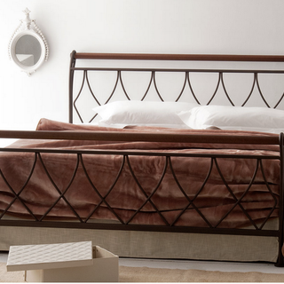 Camera da letto con letto in ferro: guida allo stile perfetto