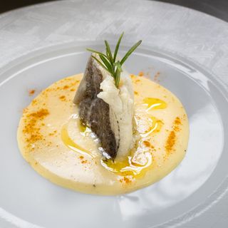 Filetto di merluzzo in oliocottura con crema di patate e curcuma