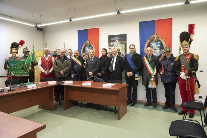 Nelle foto di Susy Mezzanotte: il murale inaugurato il 12 marzo; un momento della giornata; foto di gruppo al termine della presentazione del calendario degli eventi del IV Centenario