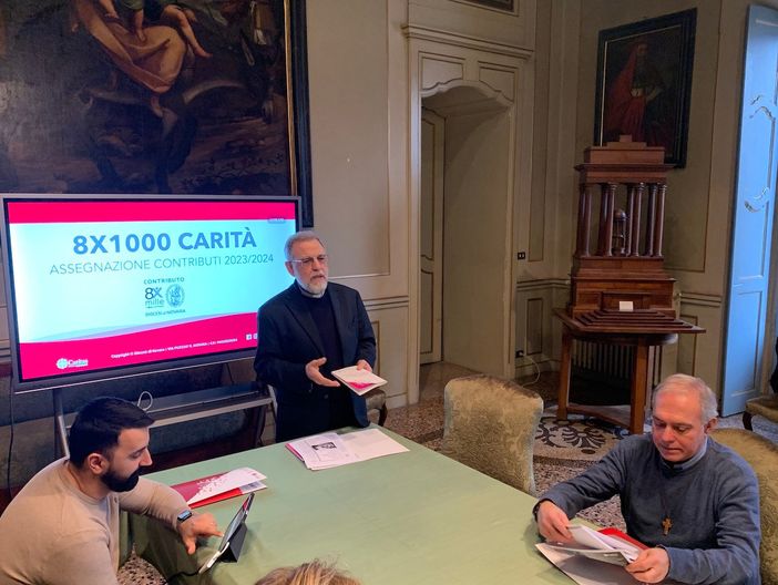 Da sinistra Federico Diotti, mons. Fausto Cossalter, don Giorgio Borroni