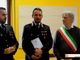 Foto: il maresciallo Sparascio al centro nella foto durante la consegna della targa
