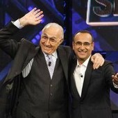 Baudo, Conti ricorda il grande conduttore: "Lui è la tv, indimenticabili i suoi abbracci paterni" Baudo, Conti ricorda il grande conduttore: "Lui è la tv, indimenticabili i suoi abbracci paterni"